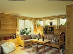Sofakrok i stuen i enebolig i Homborsund, Grimstad. Illustra