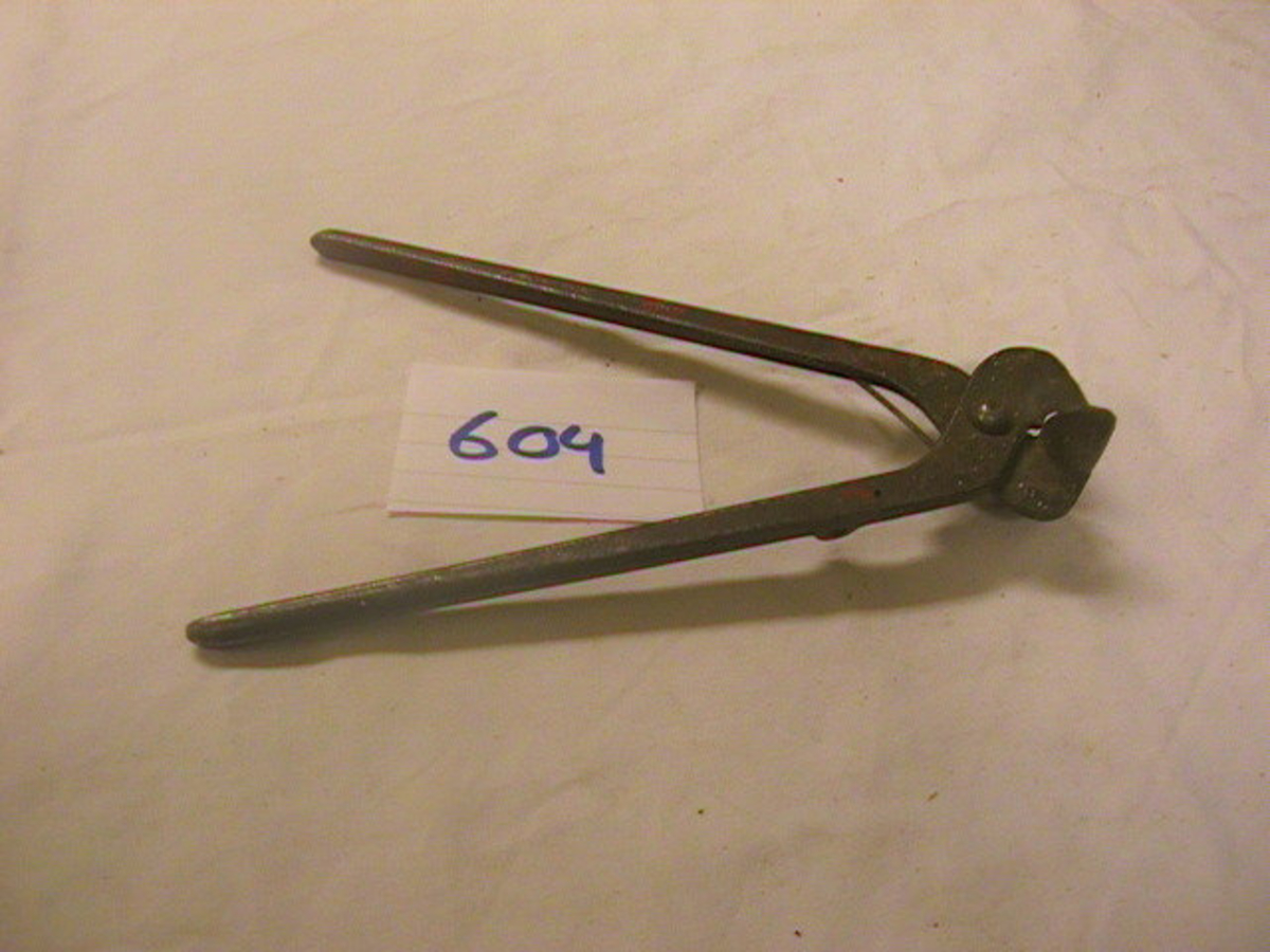 Form: to håndtak som møtes i en klype
