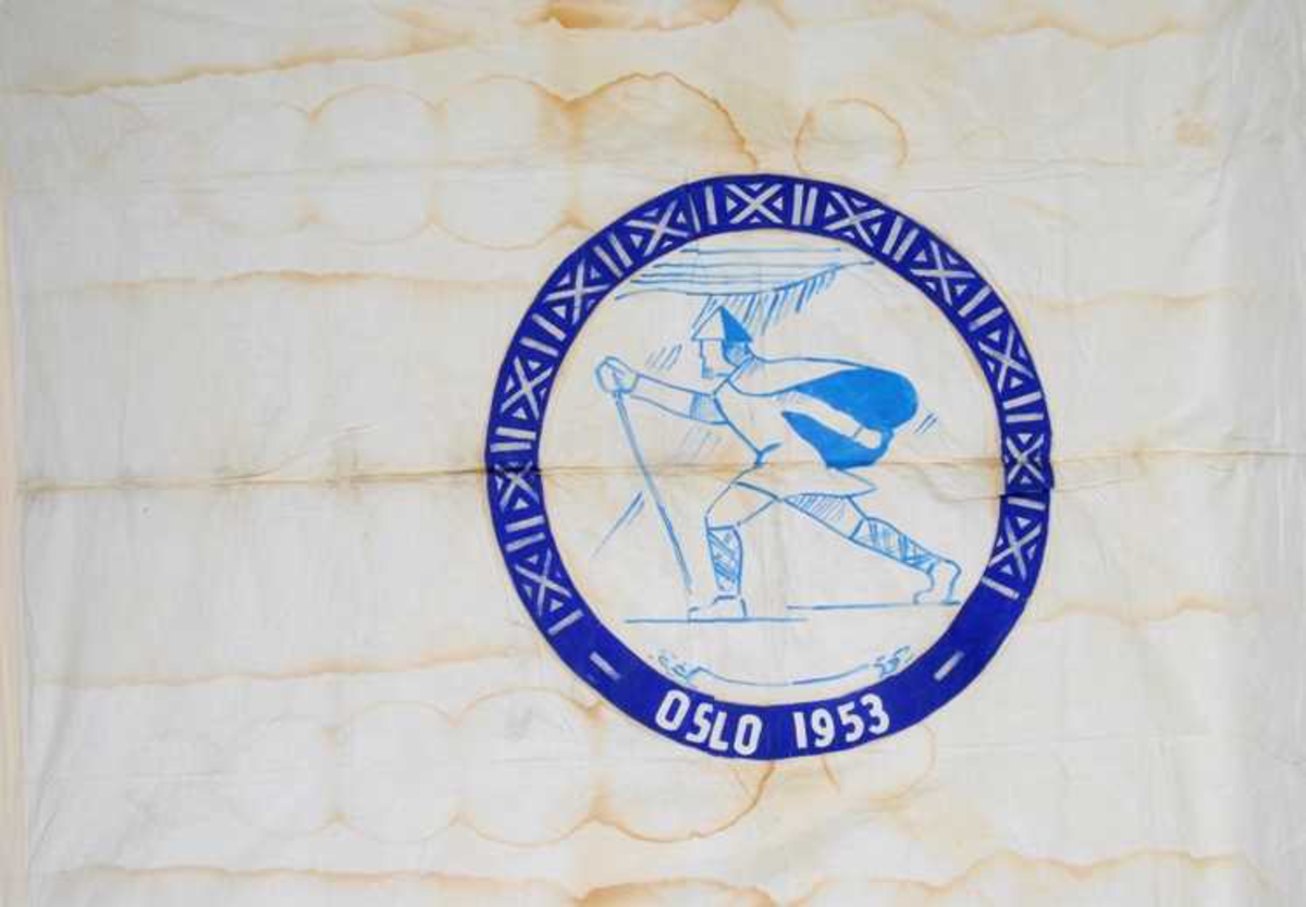 Logo for vinterlekene for døve i Oslo 1953: Birkebeiner på ski