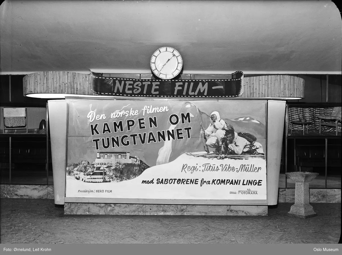 Klingenberg kino, interiør, foajé, kinoplakat: Kampen om tungtvannet, ur