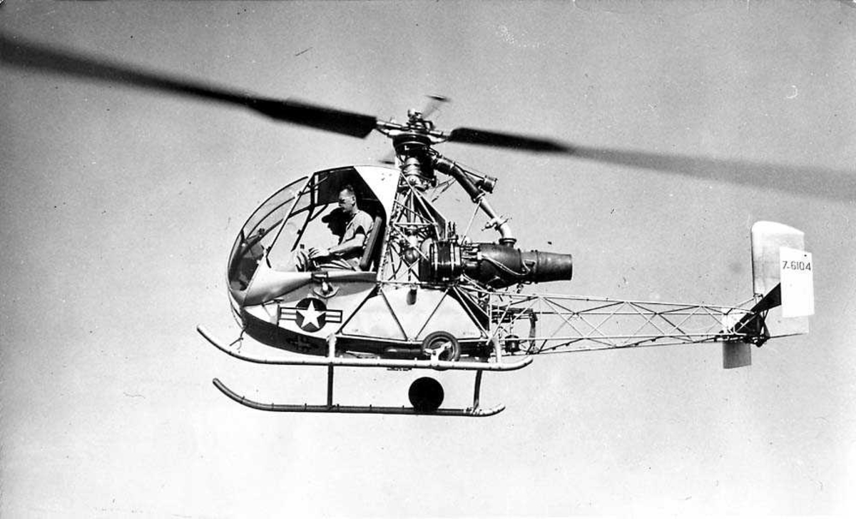 Luftfoto. Ett helikopter i luften, S.O. 1221 Djinn.