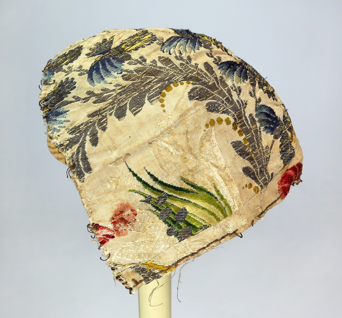 Tobladshette av silke med blomstermønster med fôr av lerretsvevd lin (eller bomull)