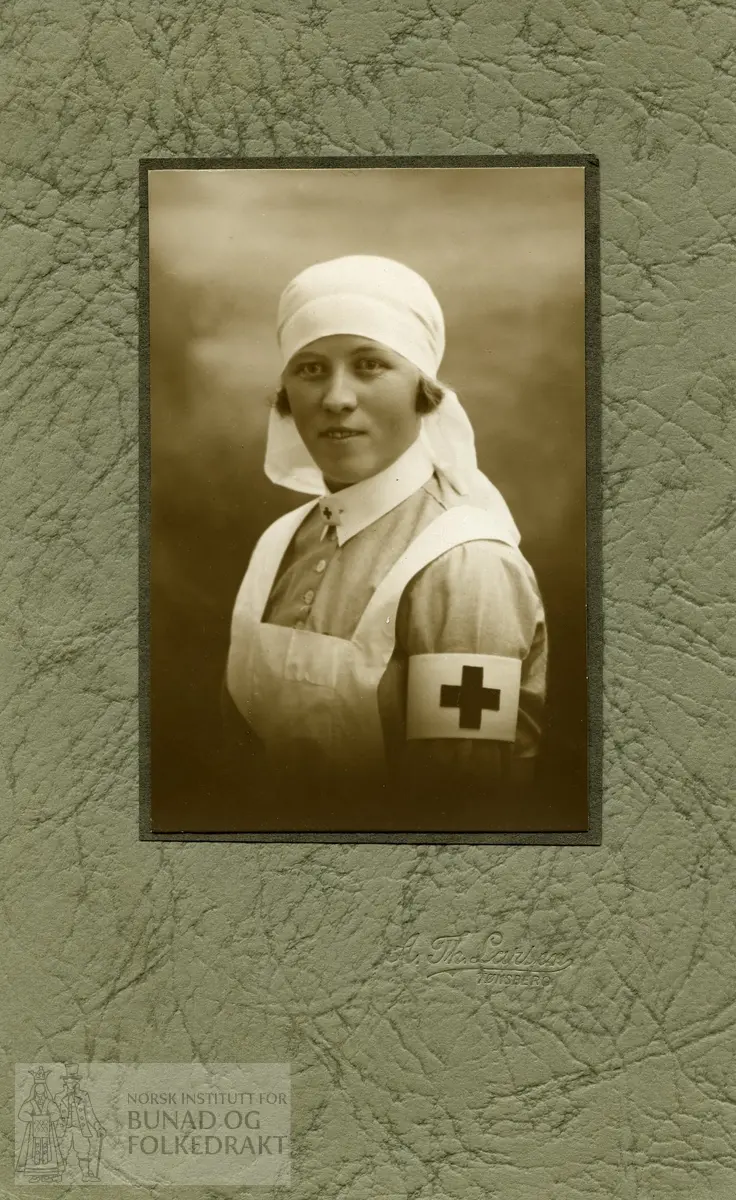 Kvinne i sykepleieruniform