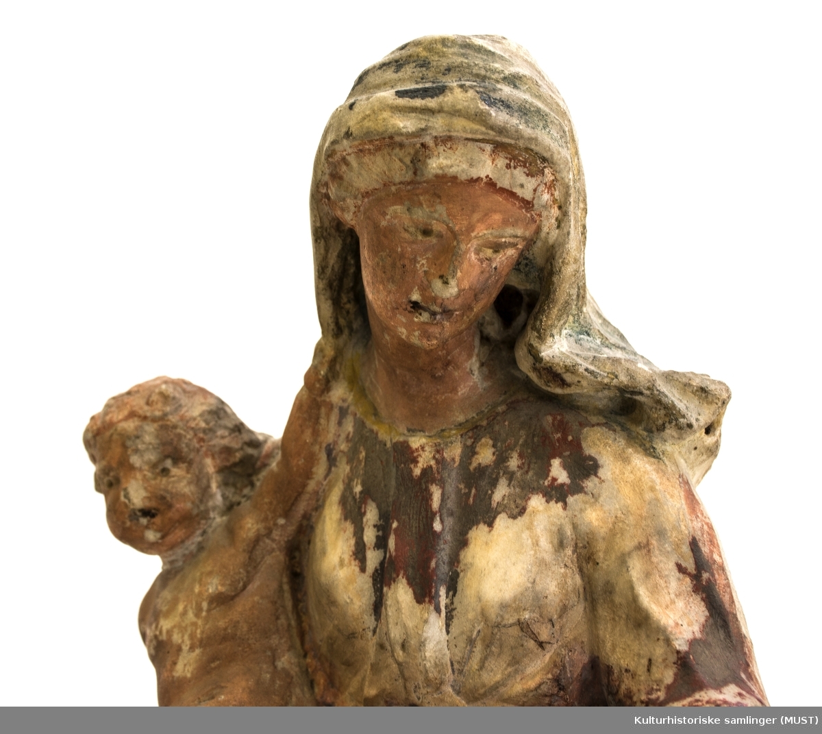 Maria med Jesusbarnet på armen.