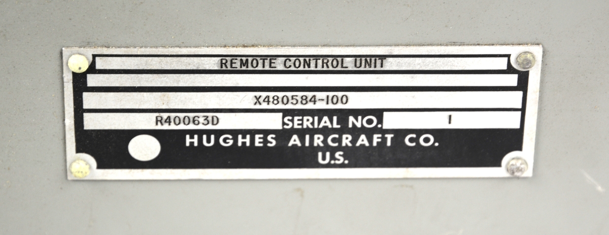 Manöverenhet Autostestare HAC 701, Förvaras i orginal förvaringskartong, ingår följekort, samt etikett med datumet 24 juni 1964. Tillverkad av Hughes Aircraft C.O U.S. Serienummer 1.