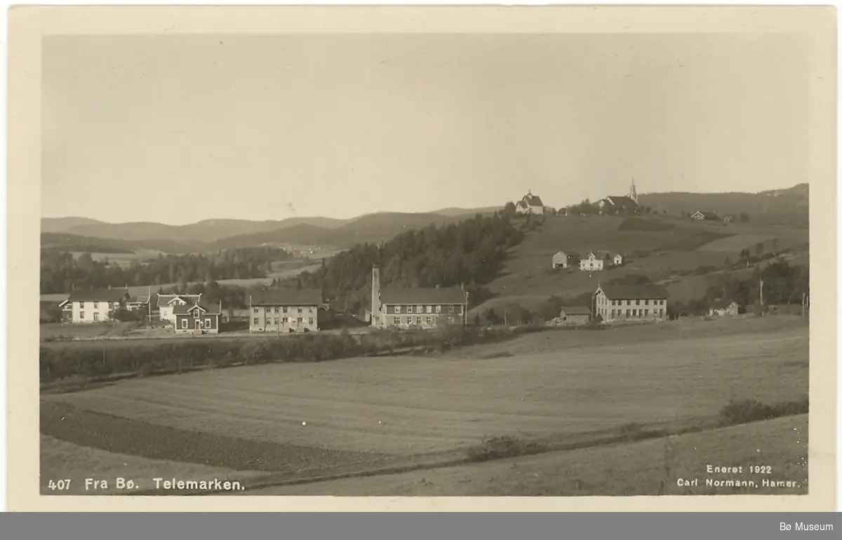 Bø sentrum med kyrkjene, Bø i Telemark, to ulike utgåver av same postkort.