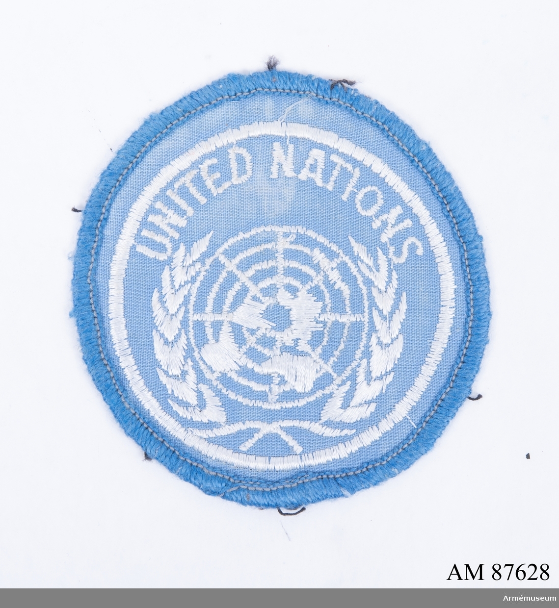 United Nation ljusblå tygmärke