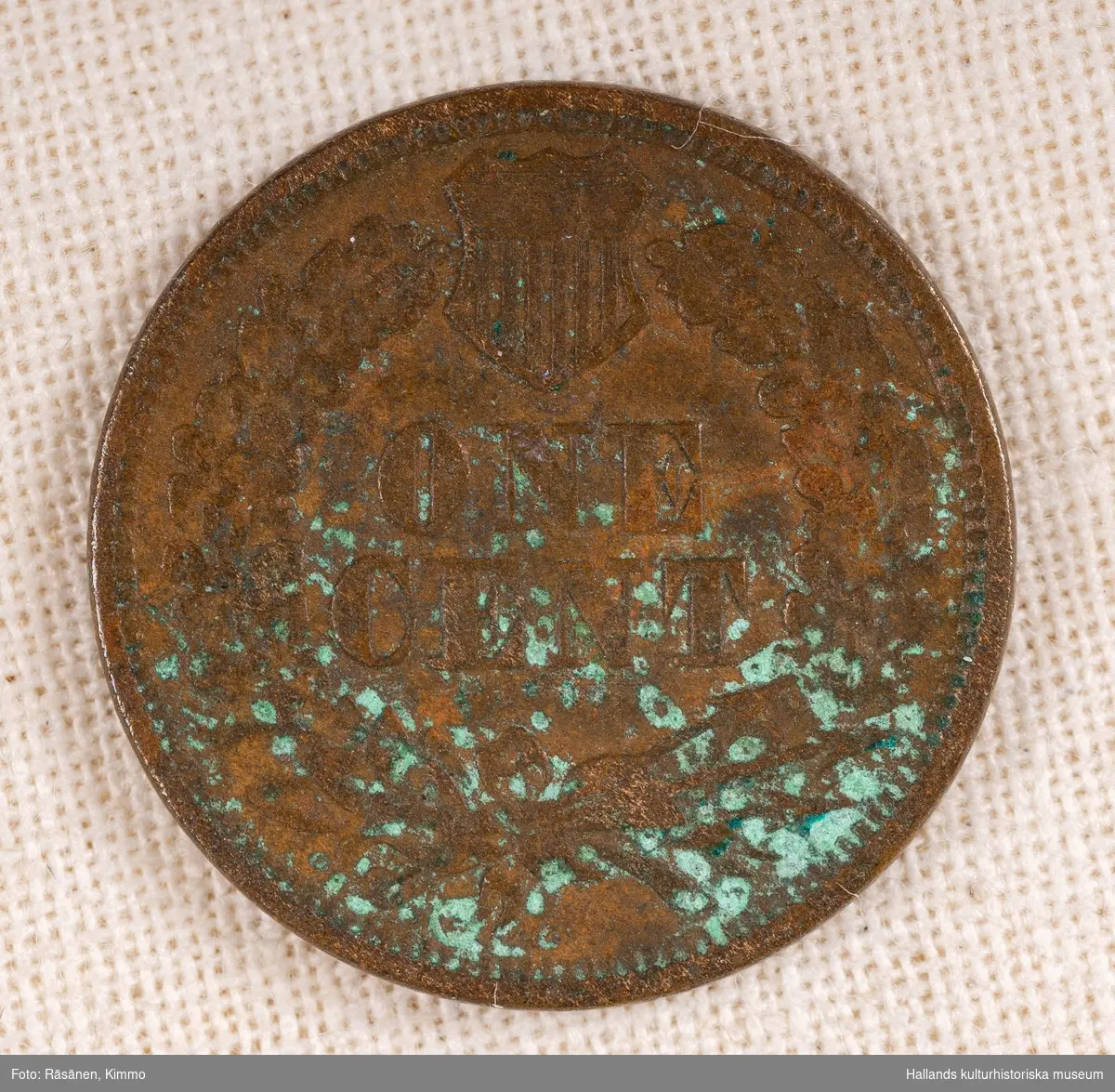 Amerikanskt kopparmynt. "One cent" "UNITED STATES OF AMERICA"Präglingsår 1867