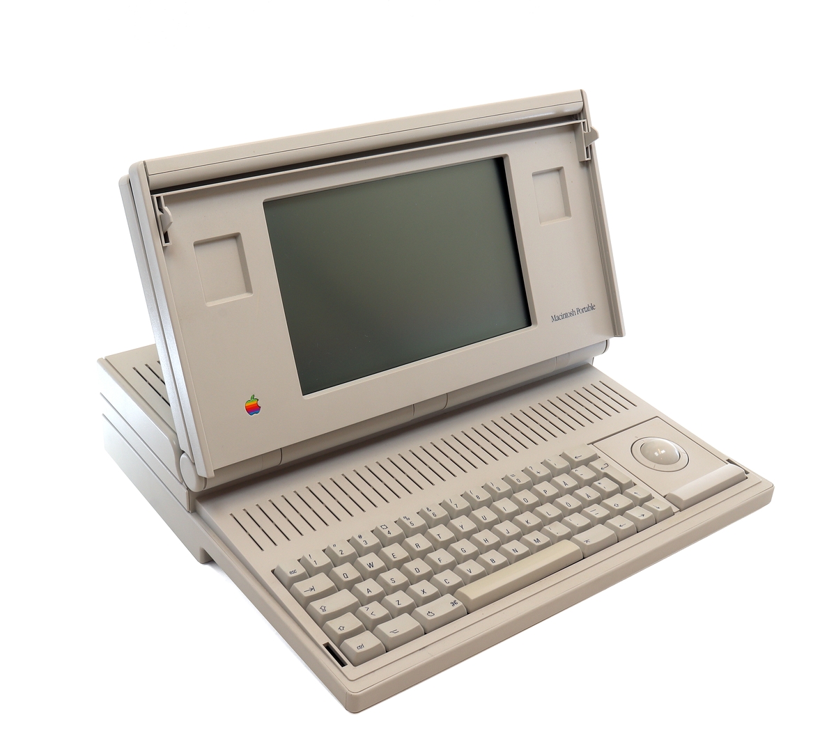 Macintosh Portable M5120 tillverkad 1989, med tillhörande laddsladd och dataväska.