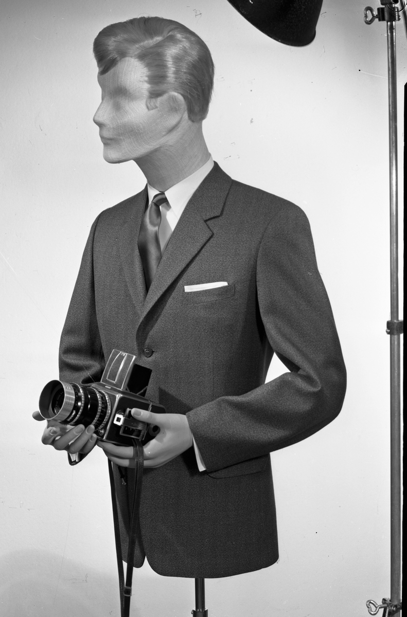Reklamfotografering Lidholms, herrmannekäng med kamera