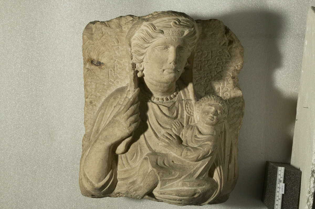 Palmyrene funerary relief with the portrait of Mezabatha, daughter of Hairan, son of Taimi with a child.