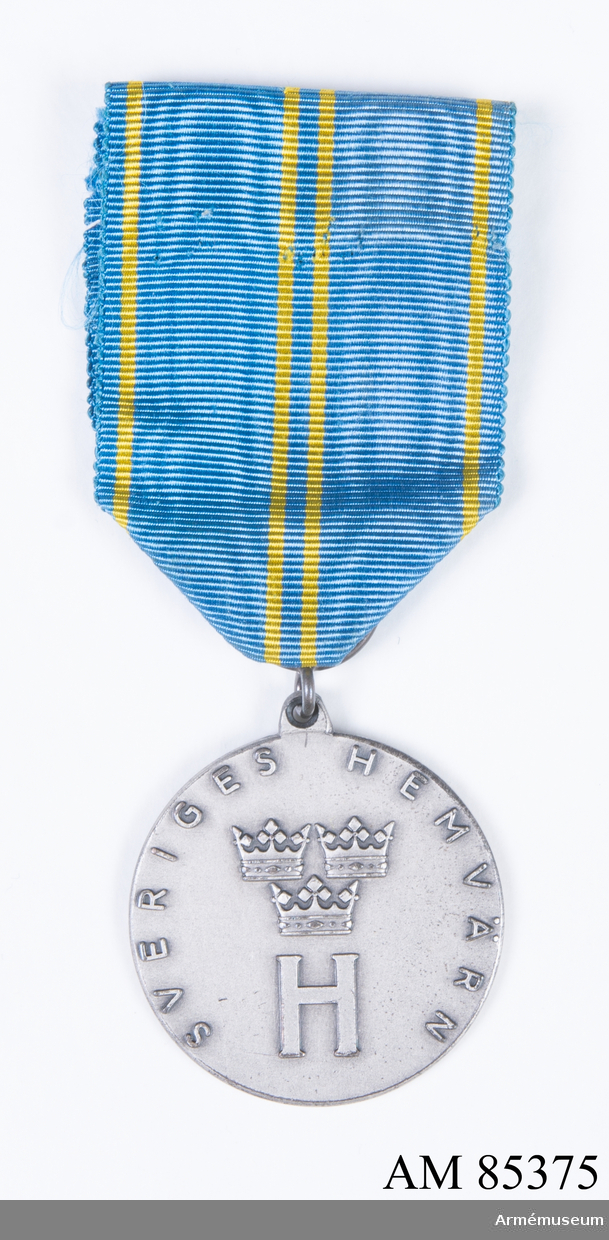 Medalj i silver med etui.