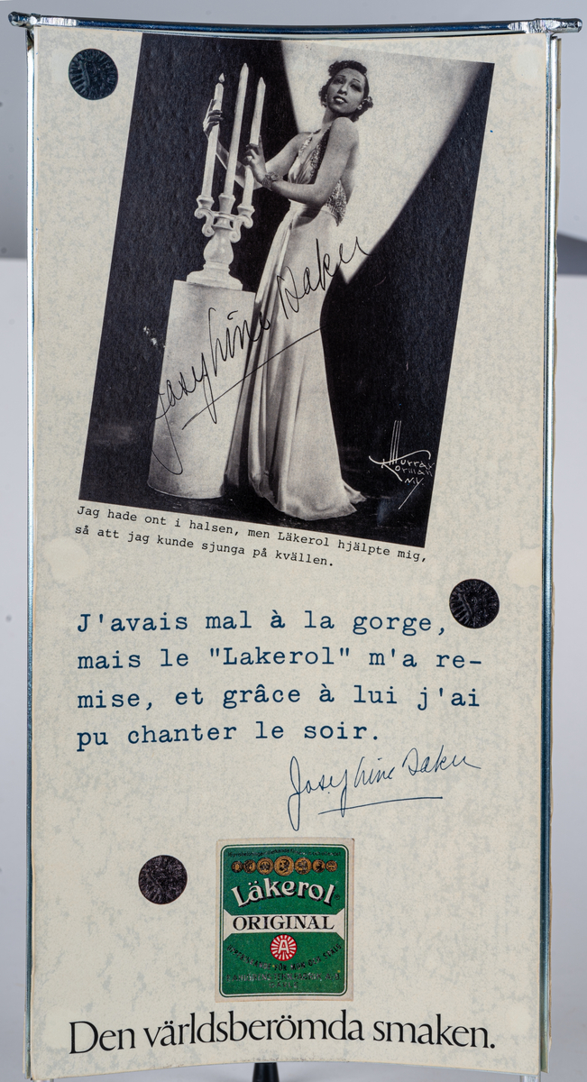Reklamskylt, reklampelare på tre ben med plastfötter, i metall och papp, för Läkerol. Intygsreklam med citat från tre kändisar: Joséphine Baker, Ernst Rolf och Maurice Chevalier på de tre sidorna.