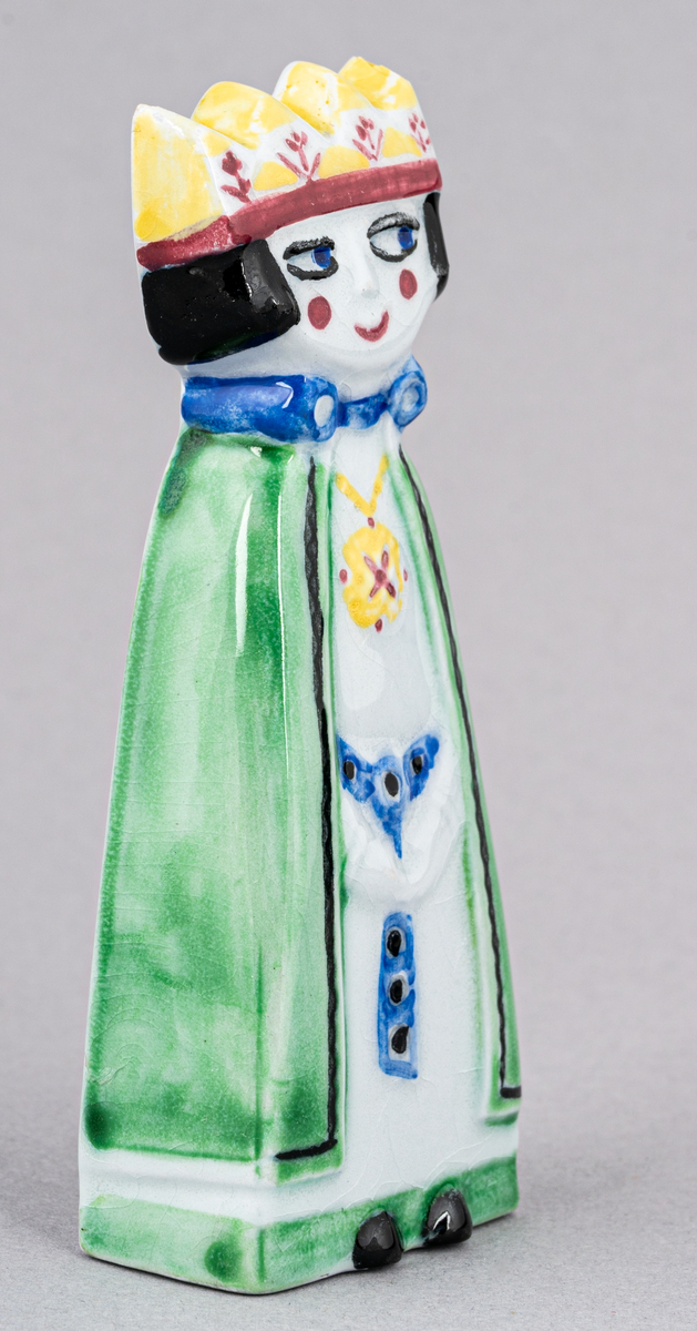 Figurin i flintgods, Prins, formgiven av Dorothy Clough 1955. Kan grupperas med två andra figurer av Clough från samma år; Kung och Drottning.