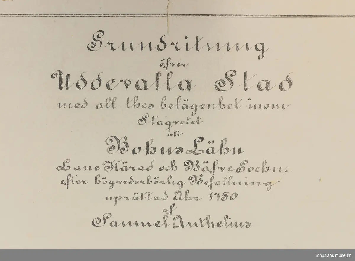 Handtecknad och kolorerad kopia av stadskarta, tillverkad och stämplad 1888. 
Anteckning nere till vänster:
"Att denna karta är enlig med
härstädes befintligt original betygar
Göteborg i länets landtmäterikon-
tor den 1 juni 1888.
Ex Officio
A. F. von Wachenfeldt
Förste Landtmätare"

Stämplad med 50-öresmärke med handskriven text över märket och vidare: 
"Tillhör 1750-års
karta öfver Udde-
valla."

Anteckning nere till höger:
Lösen        kr. 40:00
Stämpel     "    0,59
Summa       " 40.50 öre

Anteckning övre vänster hörn: Tillhör Robert Thorburn.
Övre vänster hörn avrivet. 
Fransiga kanter. Tejprester.