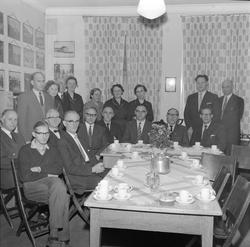 En gruppe samlet på møterommet hos Norges Finnemisjonsselska