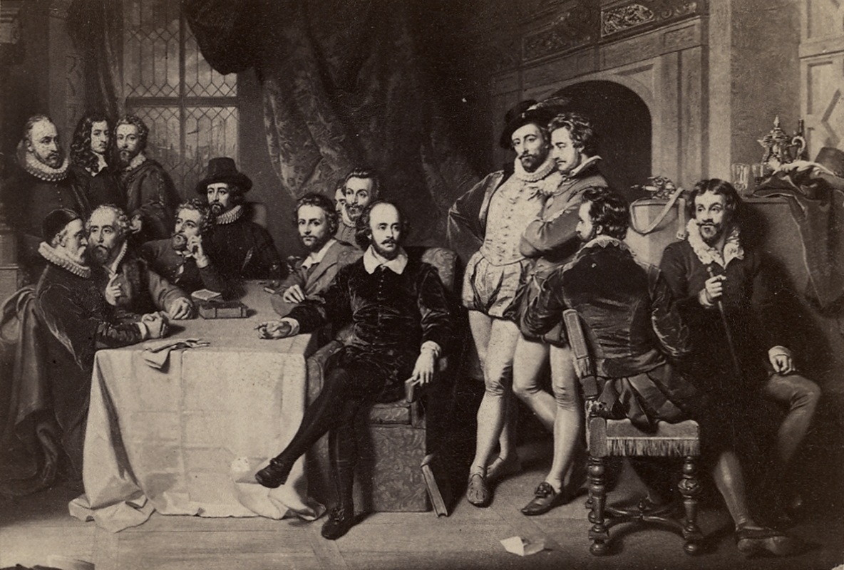 Interiör, grupp.
William Shakespeare (1564-1616) med sällskap.
Fotografiet rör Wilhelmina Lagerholms konstnärliga verksamhet.