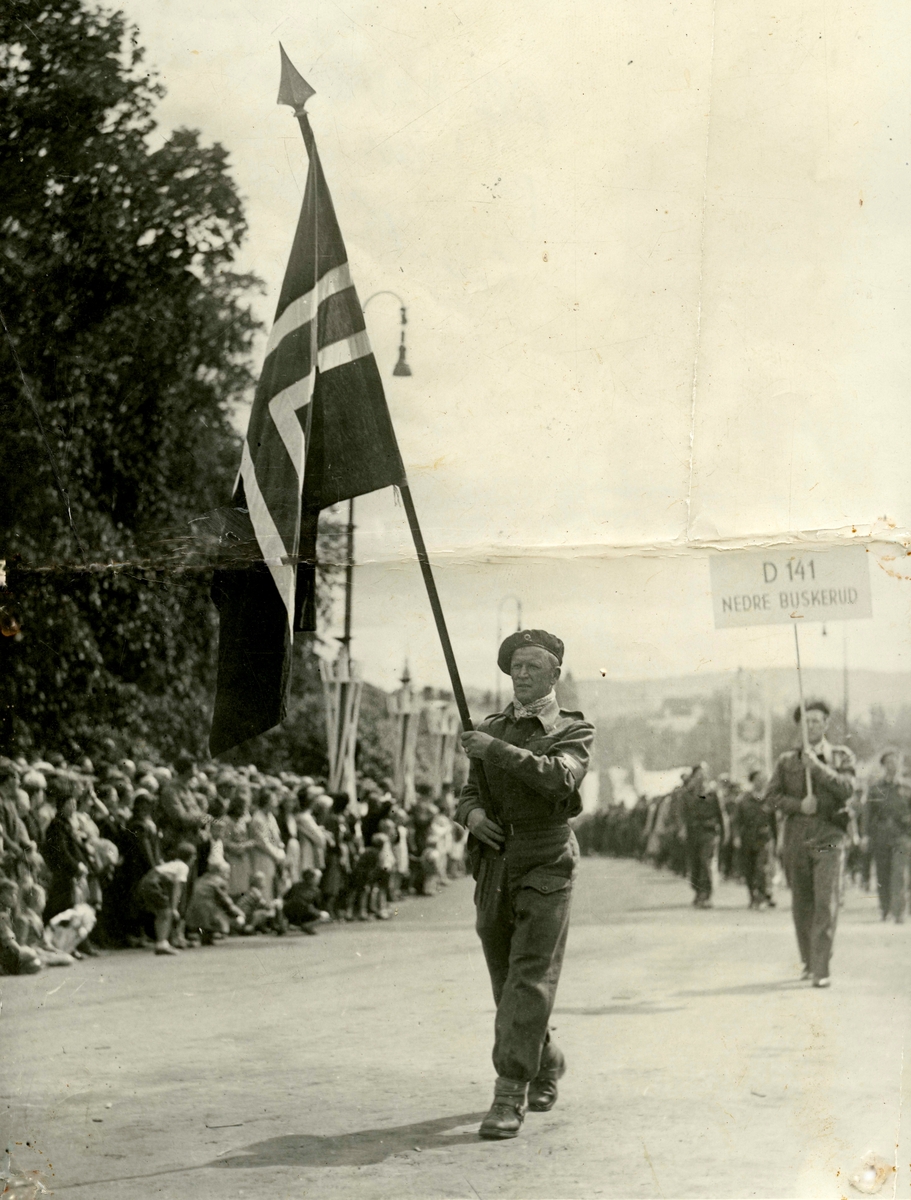 Flag bearer Birger Ruud during the parade of the Home Forces (Resistance forces) in Oslo
