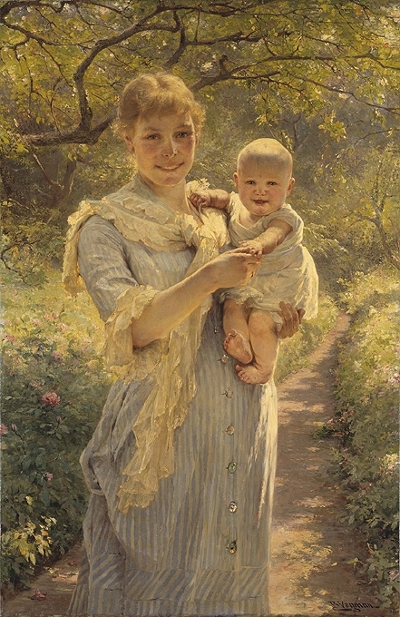 Ung mor med barn i trädgård