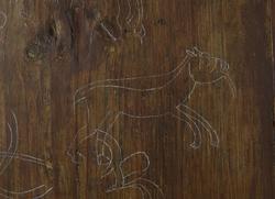 Innrissete bilder på veggen i koret i Gol stavkirke på Norsk