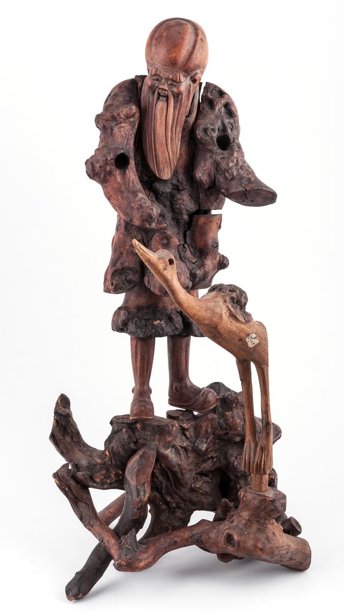 Sjömanskruiosa, kinesisk skulptur av trä.