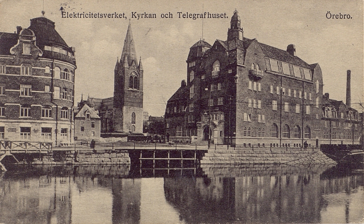 Vykort. Örebro, Elektricitetsverket, Kyrkan och Telegrafhuset.