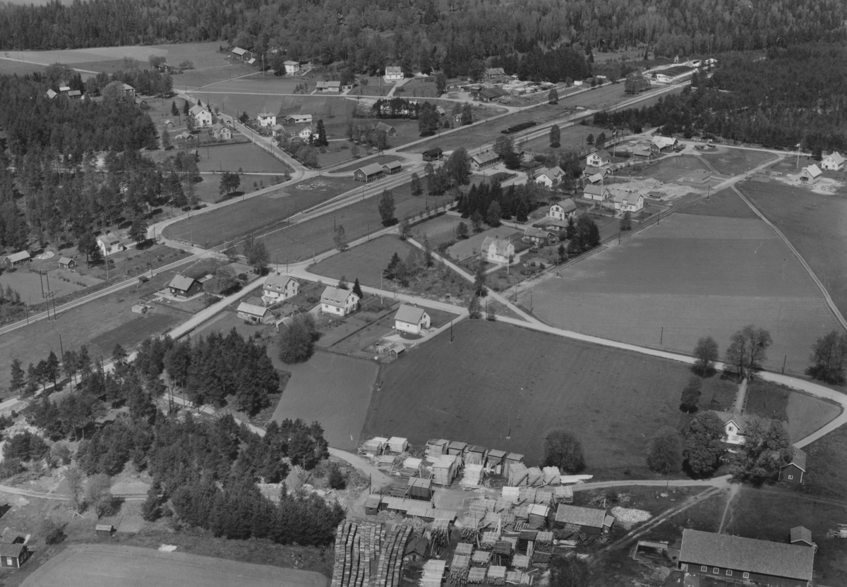 Flygfoto över Hånger i Värnamo Kommun, Jönköpings län. Nr: 313/1957