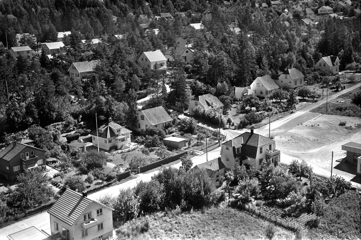 Flyfotoarkiv fra Fjellanger Widerøe AS, fra Porsgrunn Kommune. Rønningen. Fotografert av J. Kruse 08.08.1959.