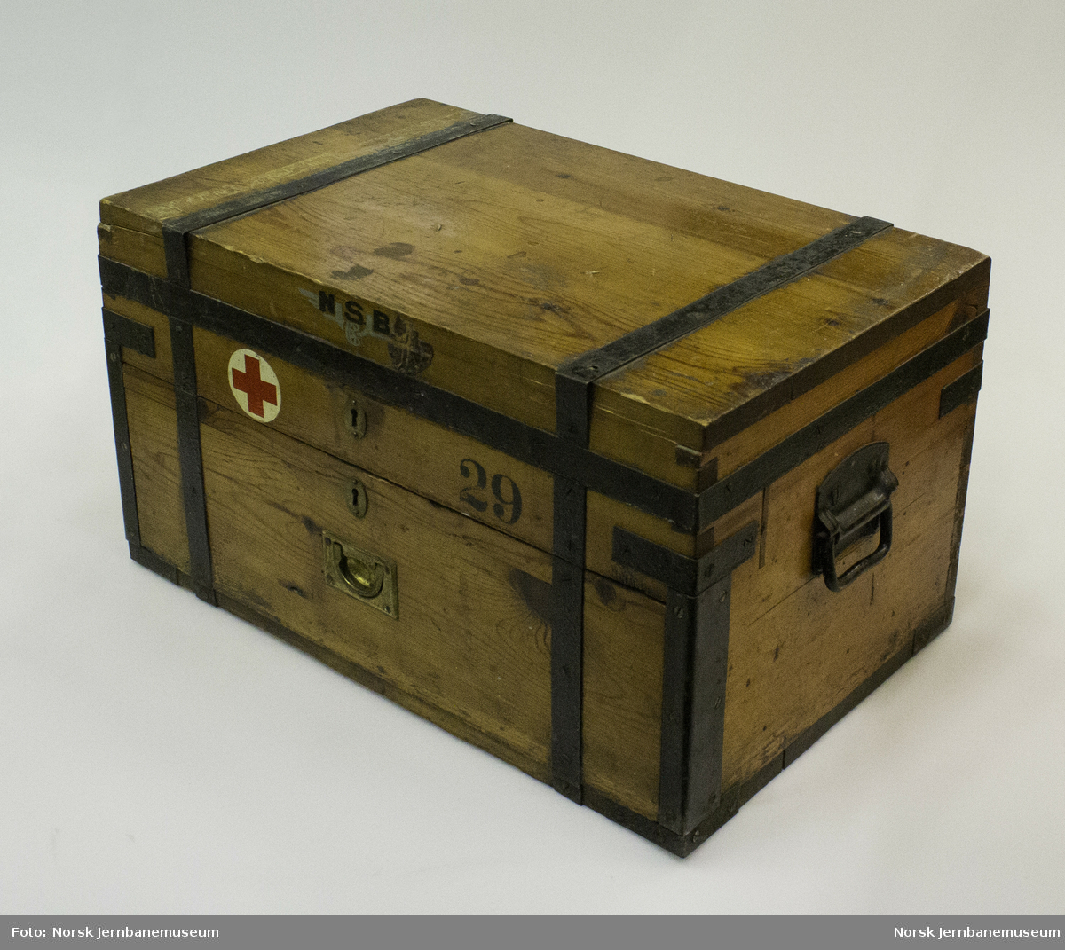 First aid box from the National state railsways (NSB) company health service. Contents include medicines, bandages and various first aid equipment.