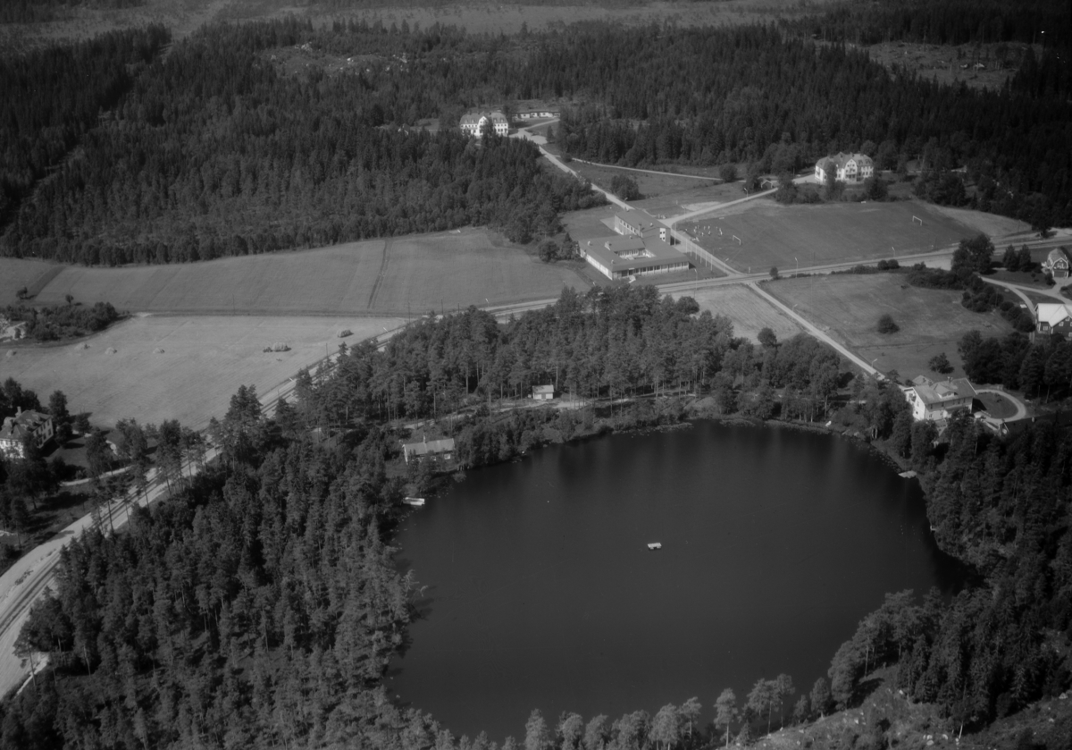 Flygfoto över Malmbäck i Nässjö kommun, Jönköpings län. 1253/1966