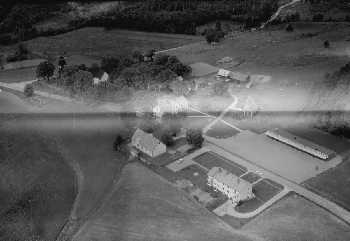 Flygfoto över Askeryd i Aneby kommun. Jönköpings län. 1310 / 1966