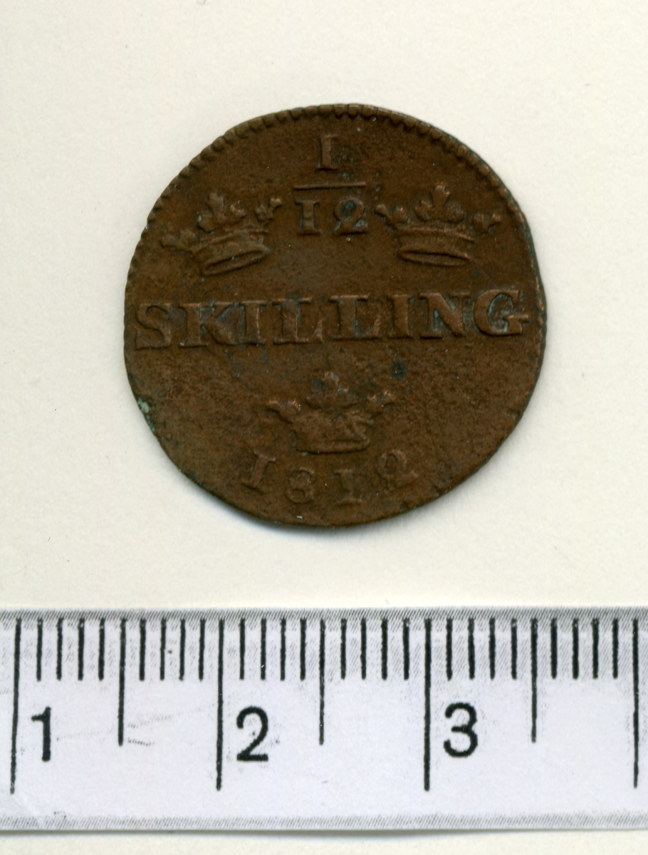 9. 1/12 skilling 1812 Carl XIII.

12 mynt, funna vid inventering i Fornsalen 1951.