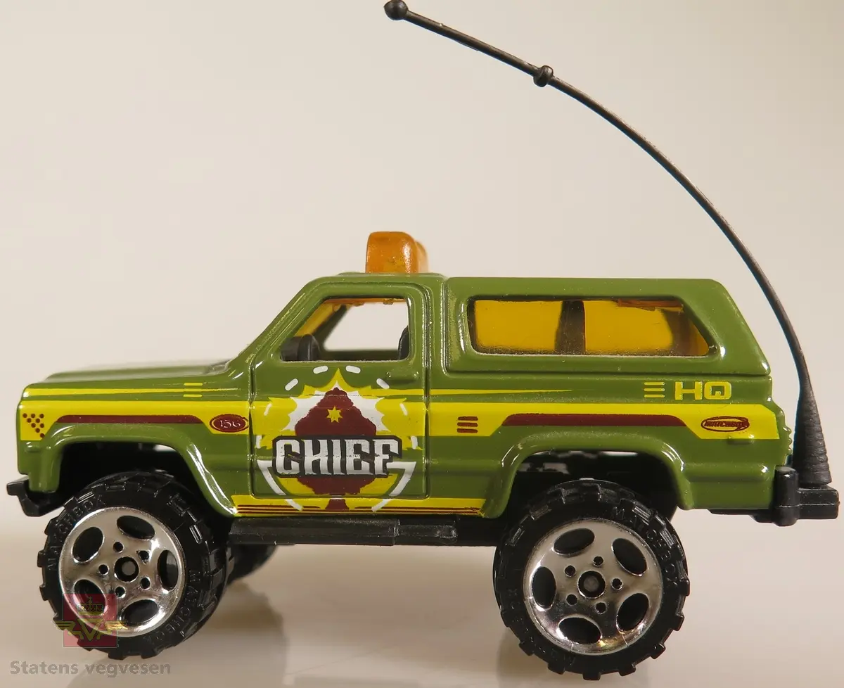Modellbil av en Chevy Blazer, modellbilen er farget grønn.
