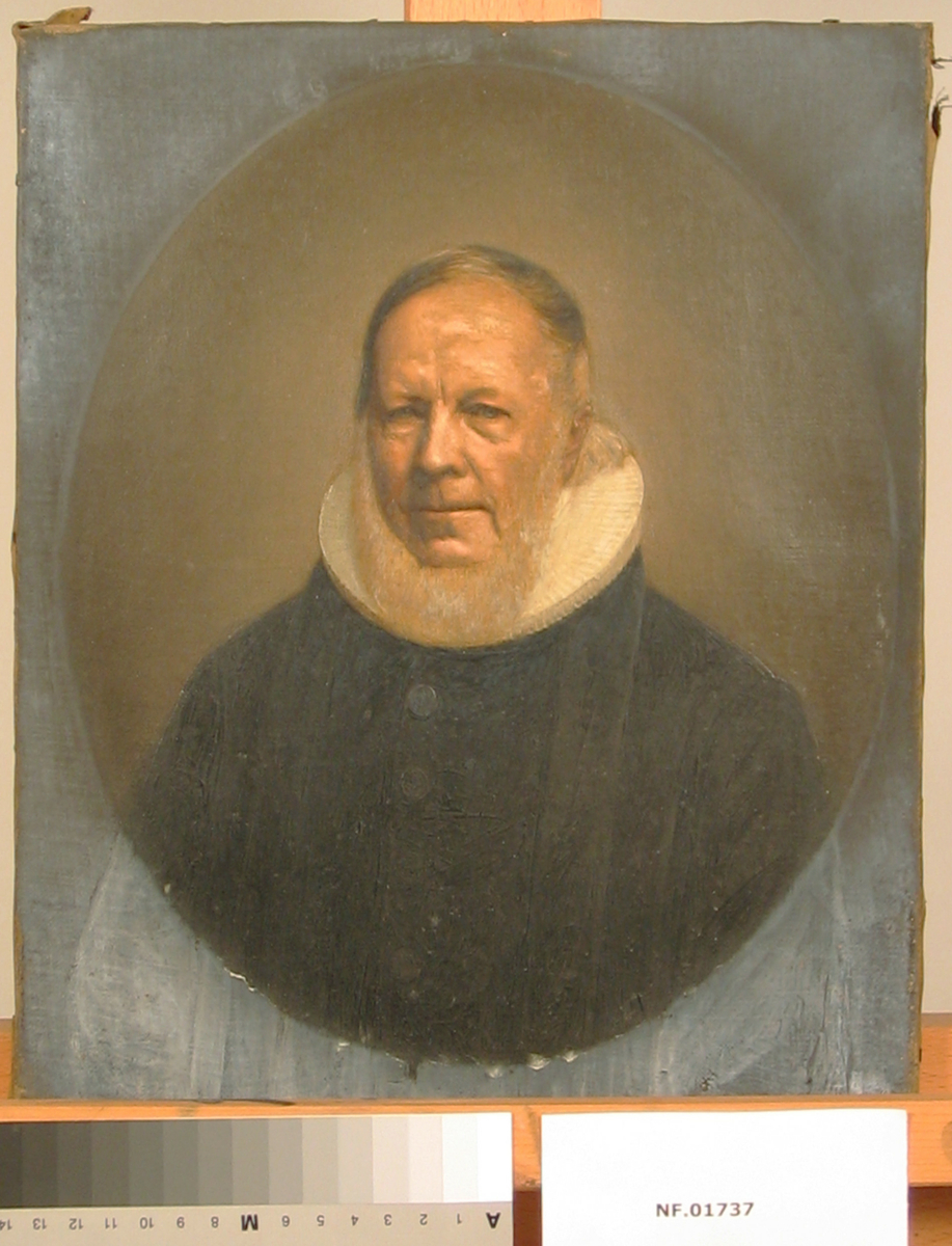 Portrett, brystbilde av sogneprest A.W Wexels i prestekjole med pipekrage.