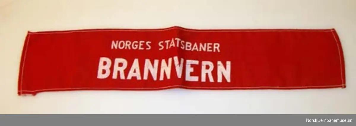 Armbind "NORGES STATSBANER / BRANNVERN"
