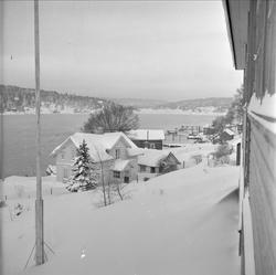 Son, Vestby, Akershus, 20.01.1959. Utsikt med fjord, hus og 