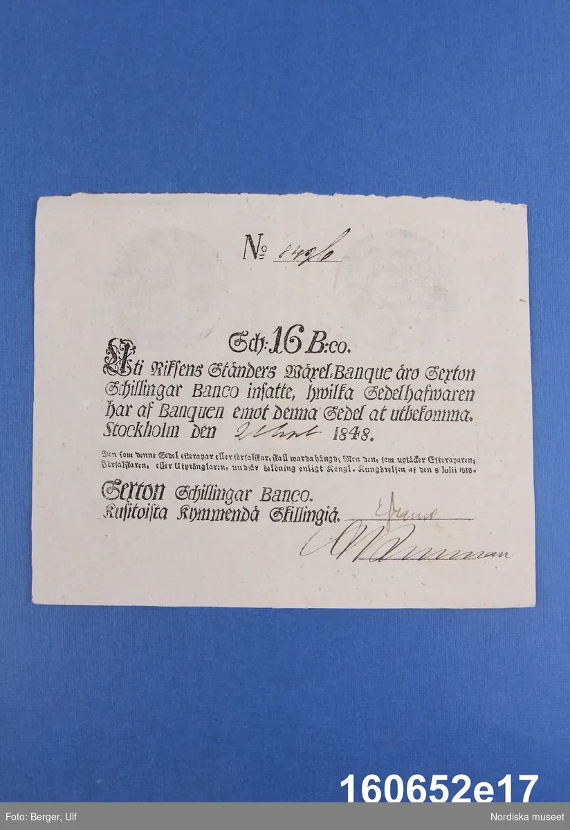 Riksens Ständers bank, 16 schillingar banco. Daterad Stockholm (oläsligt datum) 1848, nr 8496.