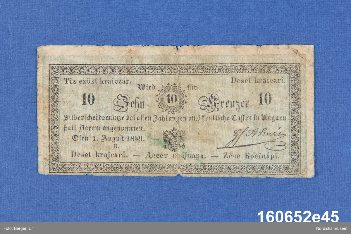 Sedel från Österrike-Ungern, 10 kreuzer, daterad Ofen [= det tyska namnet på Buda] 1 augusti 1849. På baksidan skrivet för hand med bläck "17 öre".
