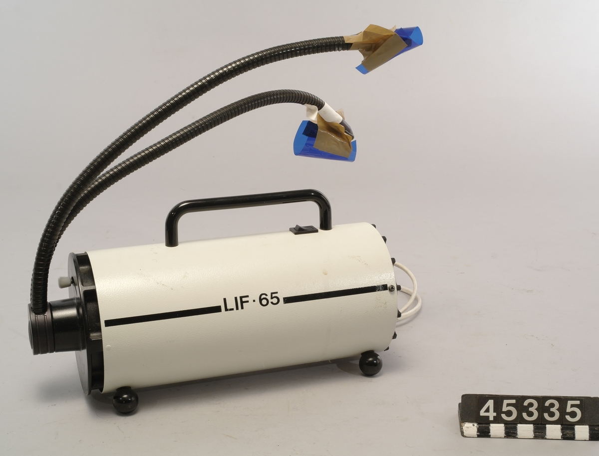 Ljusprojektor med ställbara armar för fiberbelysning. Typ LIF-65, tillverkare Lorentzen.