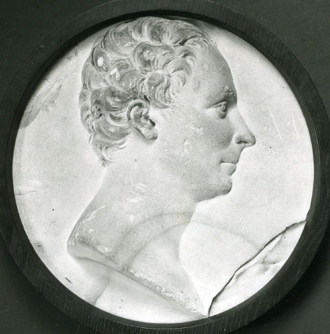 Mansporträtt i profil i medaljongform