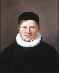 Portrett av Nicolai (Niels) Nielsen. Prestakjole og pipekrave, svart hodeplagg (kalott).