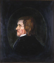 Portrett av Asgaut O. Regelstad  Mann med brunt halvlangt hår, hvit skjortekrage, mørk kledning  Innskrevet i oval, lysere enn resten av bakgrunnen (Foto/Photo)