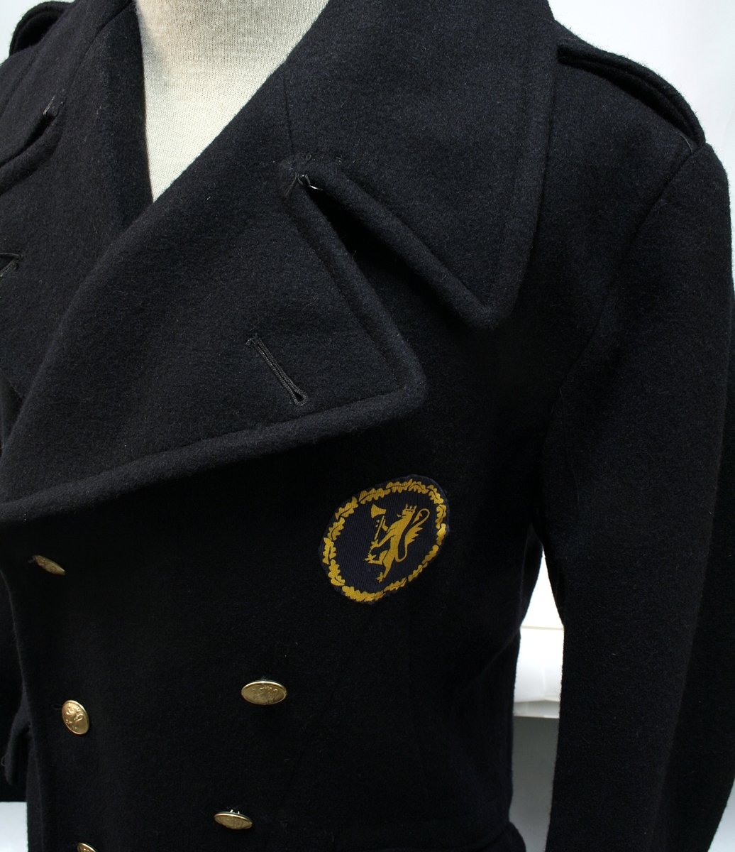 Batteluniform, frakk. Modell 1953. Elev ved Politiskolen. Uniformen tatt i bruk ved opprettelsen av Politihøgskolen.