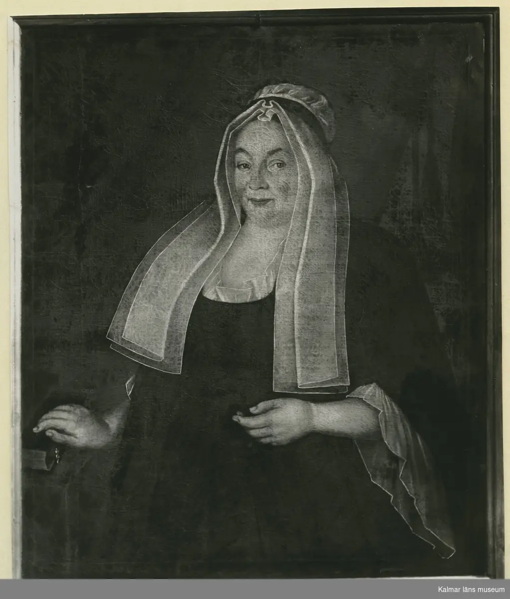 Porträtt av Anna Wallin född Hellman, maka till kyrkoherde J Wallin, Odensvi.  Målning i Odensvi kyrka av Edvard Orm 1725.