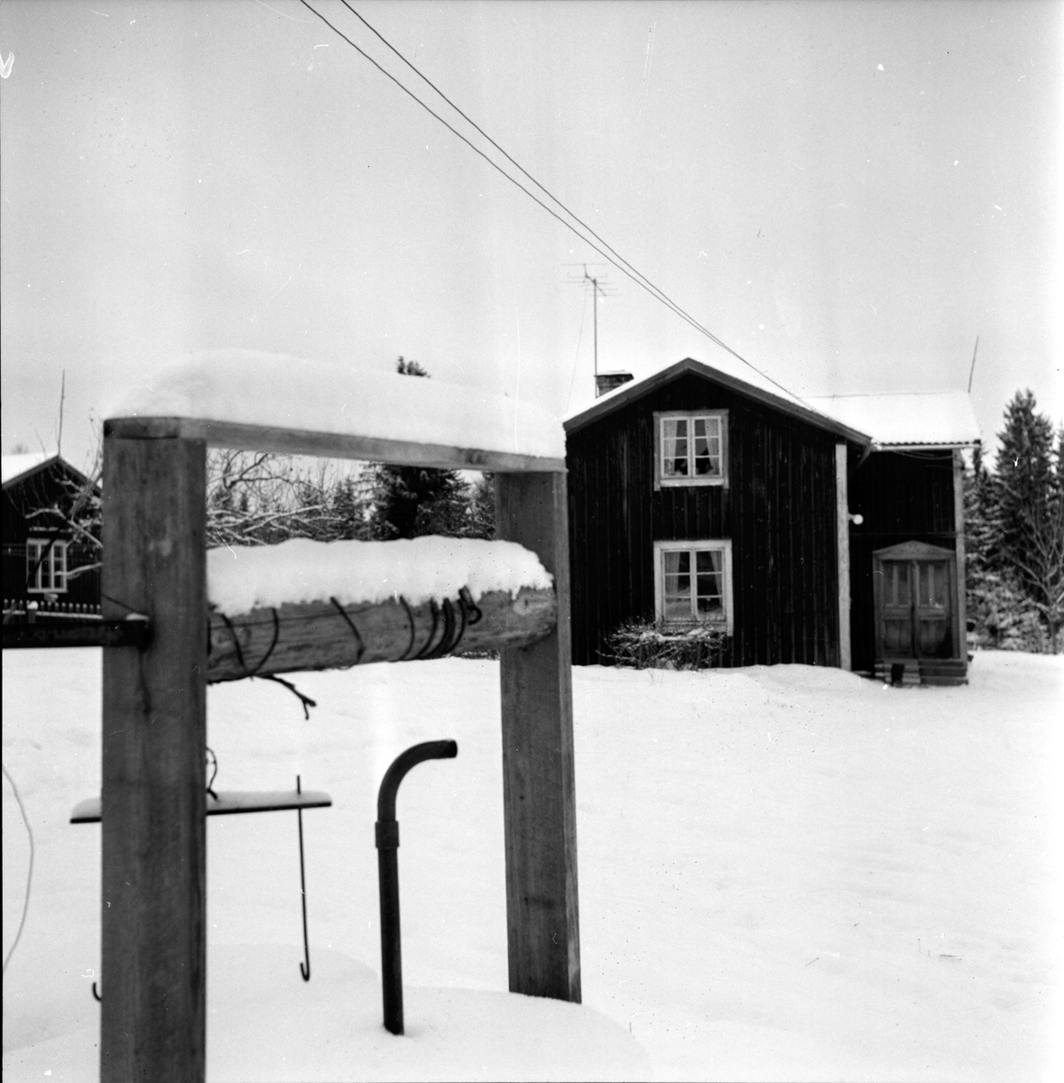 Blybergsbo, hus i vinterlandskap.