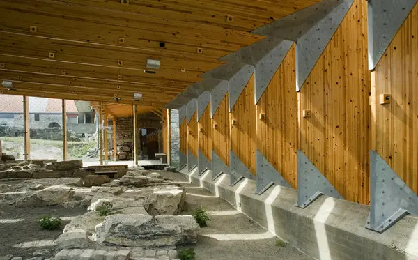 Sverre Fehn: Glulam, steel and glass construction covering medieval ruins.