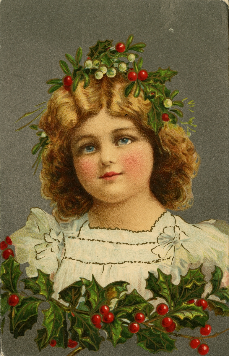 Julekort. Jule- og nyttårshilsen. Portrett av en pike med misteltein og kristtorn i håret, pyntet med krisstorn nederst. Stemplet 22.12.1911.