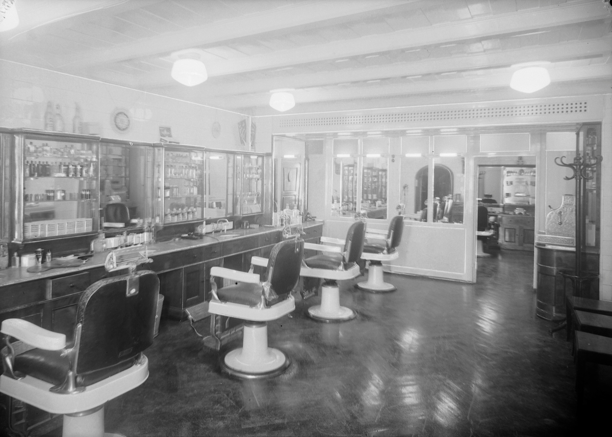 Britannia Barbersalon. E. Sjøberg