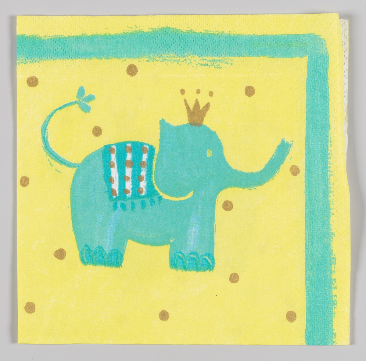 En lyseblå elefant med gullkrone på en gul bakgrunn med gullprikker

SAmme motiv som på MIA.00007-003-0137