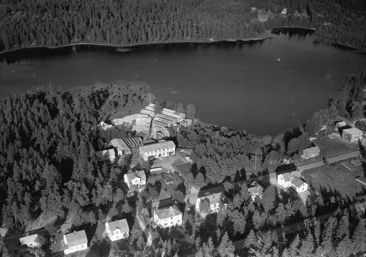 Flygfoto över Hestra i Gislaveds kommun. Nr H 1948